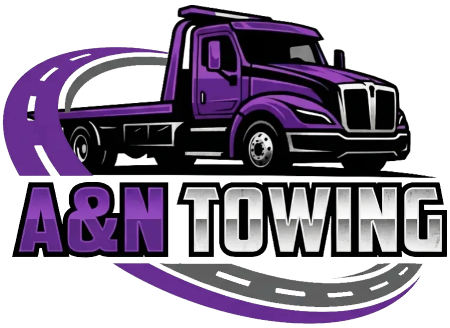 A&N Towing logo featuring a purple flatbed tow truck and highway graphic