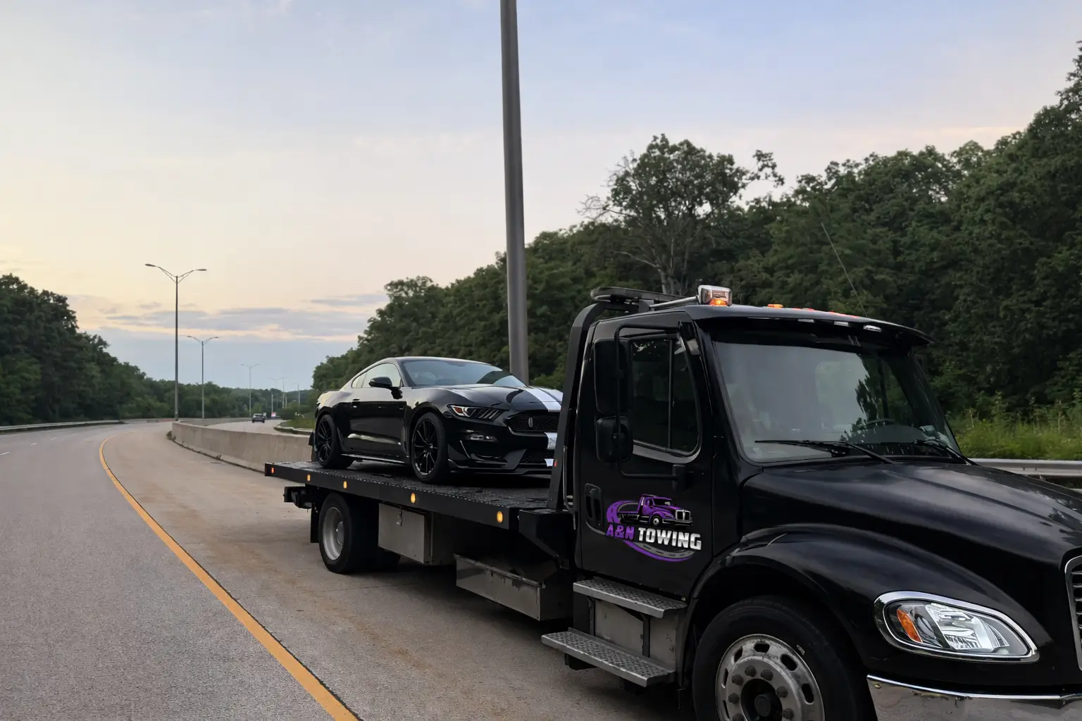 A&N Towing truck providing north suburbs towing service on a highway in Chicagoland